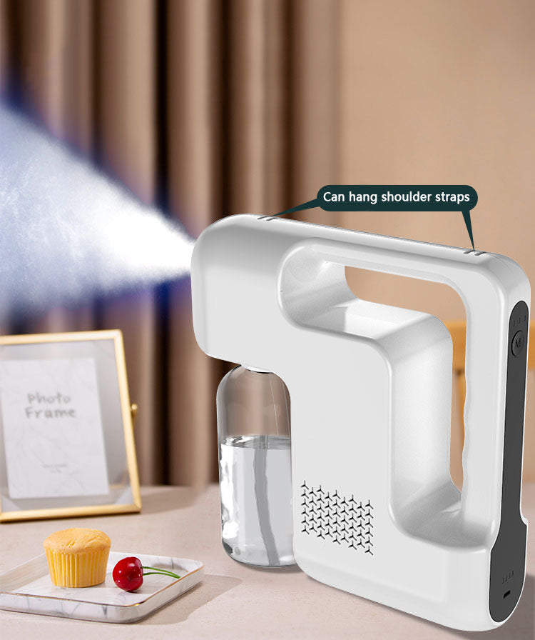 Hand-held wireless nano spray disinfection gun blue ray disinfection gun rechargeable spray gun alcohol atomization spray machine
